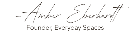 Text-based logo with the name Amber Eberhardt, Founder of Everyday Spaces in elegant script and serif font on a black background.