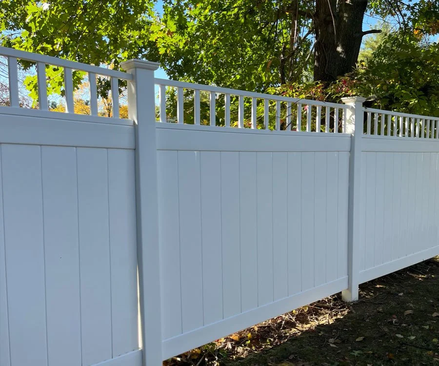 Clean white vinyl fence