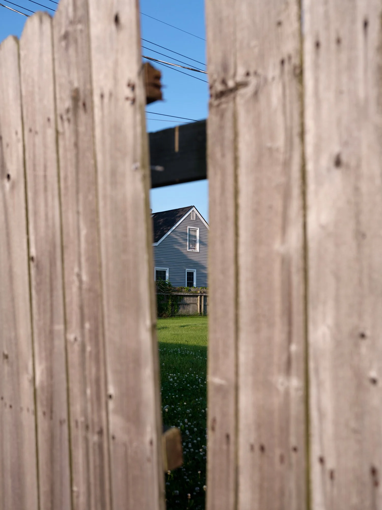 08 - HouseThroughFenceFrazo copy 3.jpg