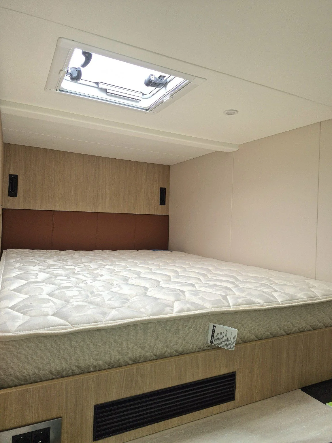 Cabin berth and fitted timber cabinetry aboard SUR | Jaluit.