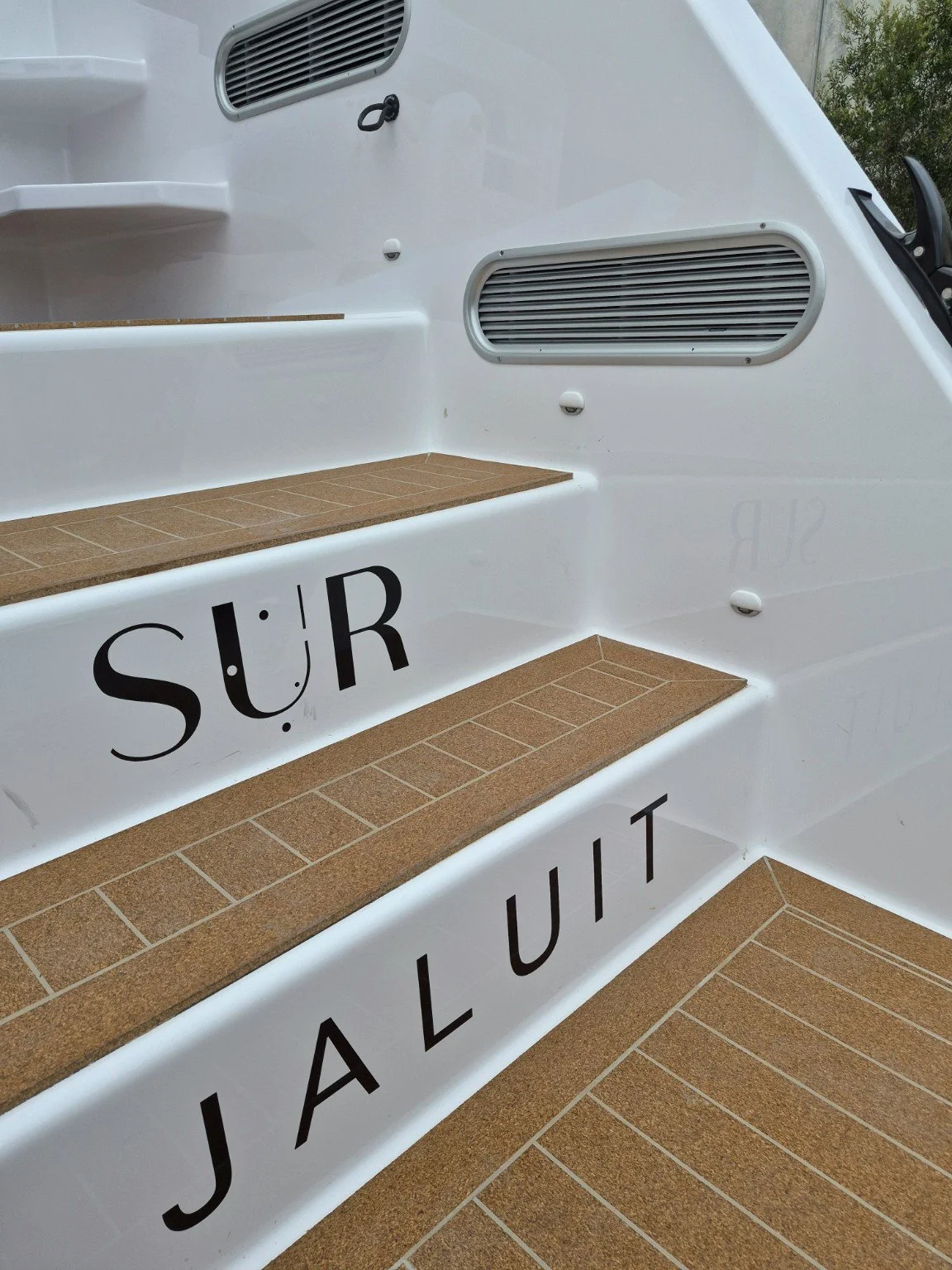 SUR | Jaluit boarding steps and transom detail.
