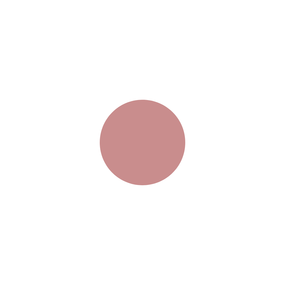 Black teapot with a pink circular handle and a pink circular knob, shot from above on a black background.