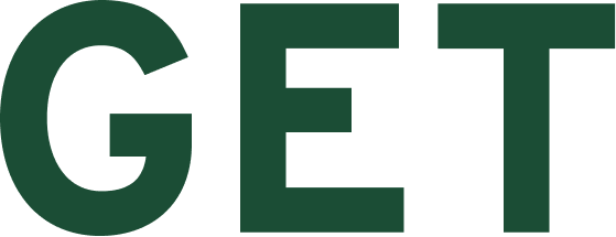 Close-up view of the letters 'GET' in bold, dark green font on a black background.