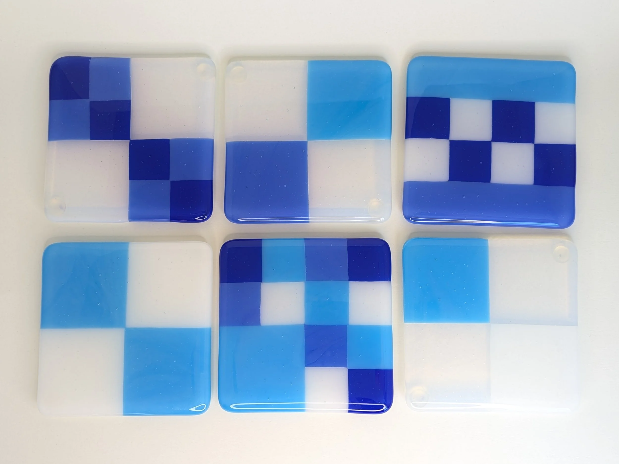 6 blue, white and transparent geometric coasters