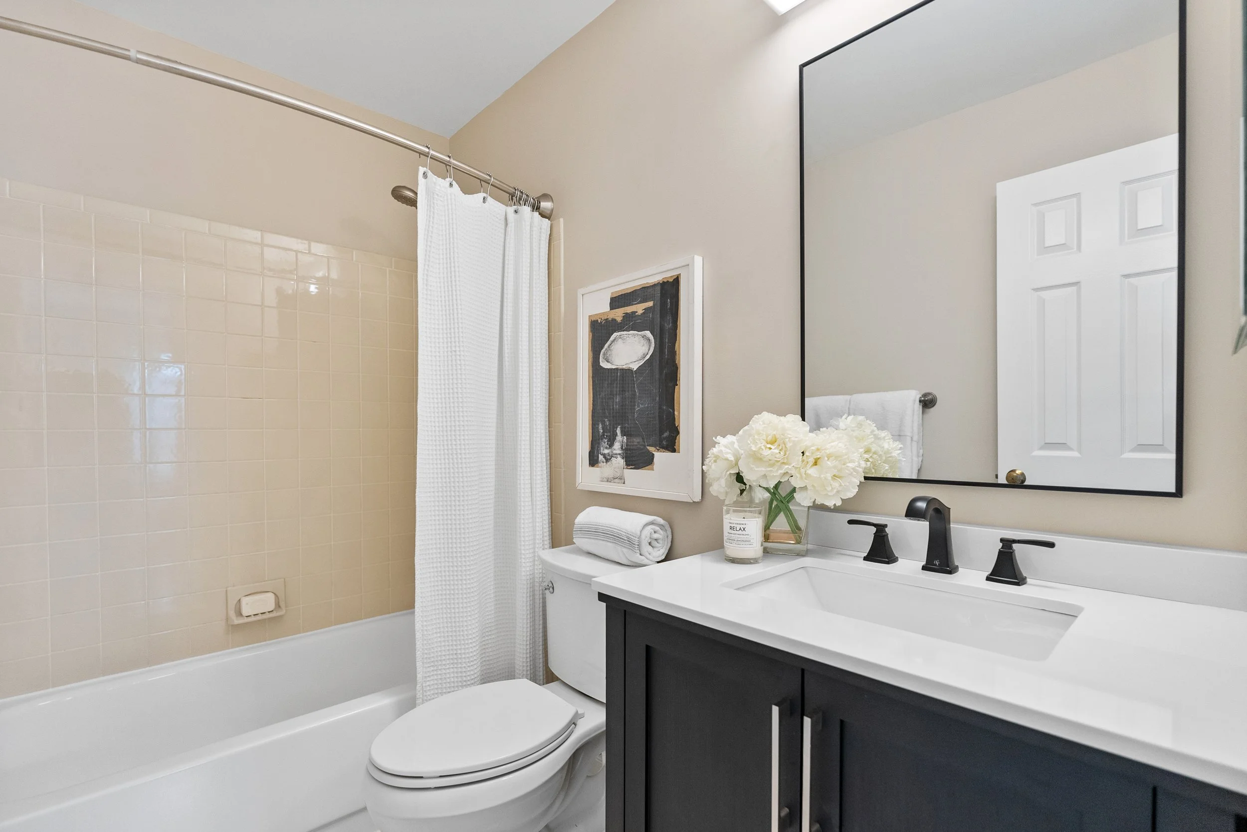 Renata Briggman's staging transformation in Arlington VA after photo of the bathroom.