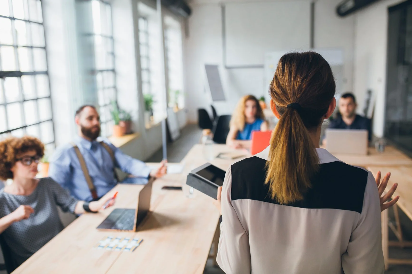 employees at a workplace in Virginia listen to speakers on mental health