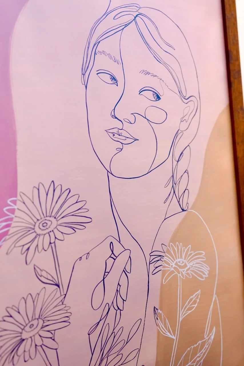 Line art drawing of a woman with flowers, with hair in a braid, on pink background.
