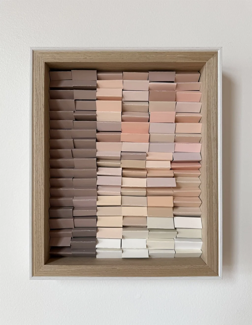 Minimalist neutral art in peachy, pink, white and sand tones. Inspired by architecture and  building facades. Abstract textured wall art, made of reclaimed paint swatches. Arist based in Vernon, BC, Canada. Mixed media abstract, sculptural, dimension
