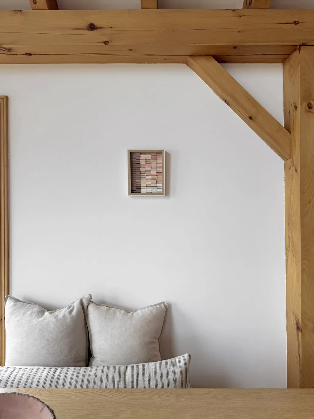 Minimalist neutral art in peachy, pink, white and sand tones. Inspired by architecture and  building facades. Abstract textured wall art, made of reclaimed paint swatches. Arist based in Vernon, BC, Canada.