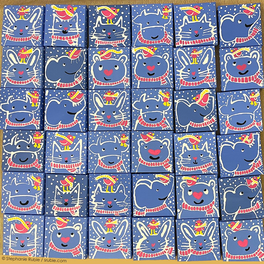 multiple rows of blue square paintings (36 total) with white line art of cats, cows, bears, bunnies, and elephants, wearing pink striped scarves, with with pink birds on their heads, who are wearing yellow striped scarves.