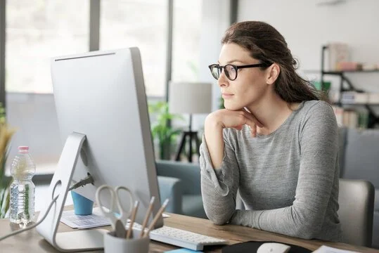 Woman looking at computer.jpg