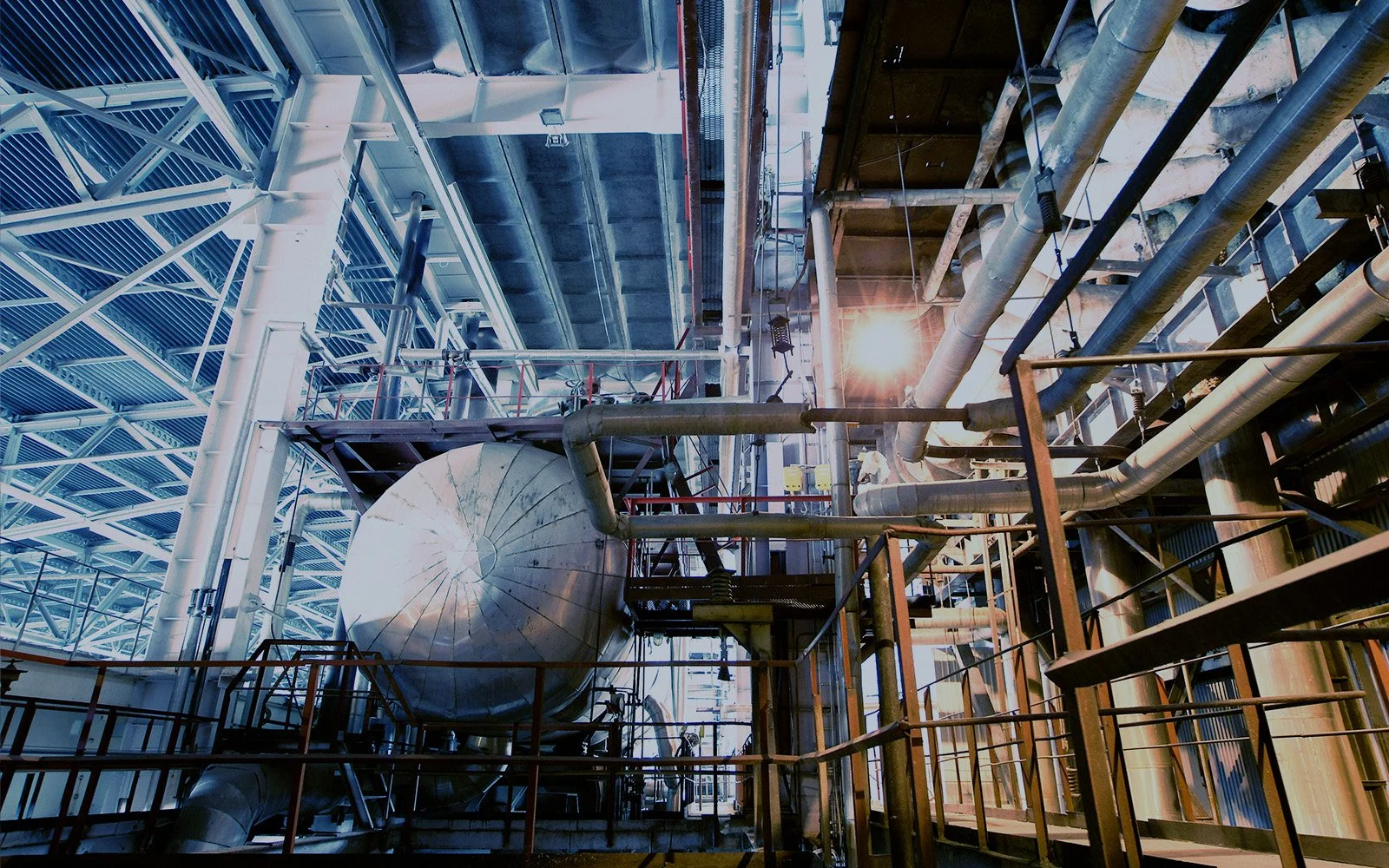 Industrial equipment sourcing inside a large scale industrial facility with piping and process systems