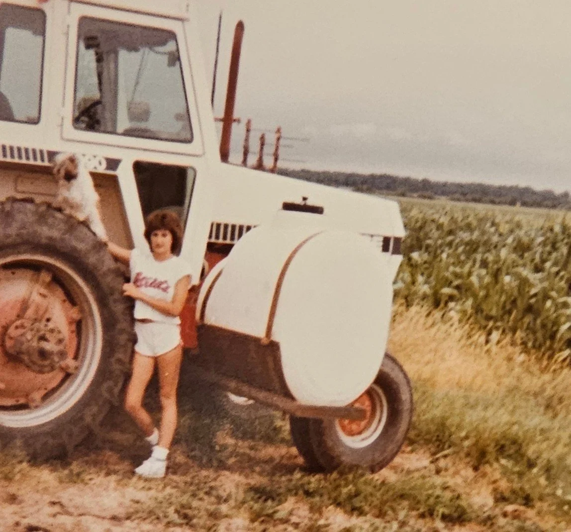 Shelly helping Dad farm