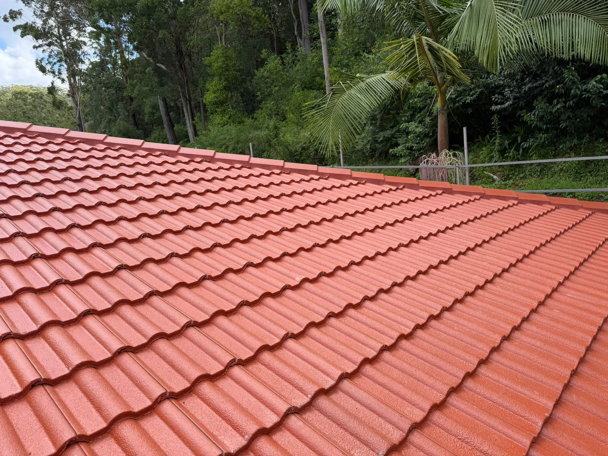 Central coast roofing. Close-up of newly installed roof tiles on residential property