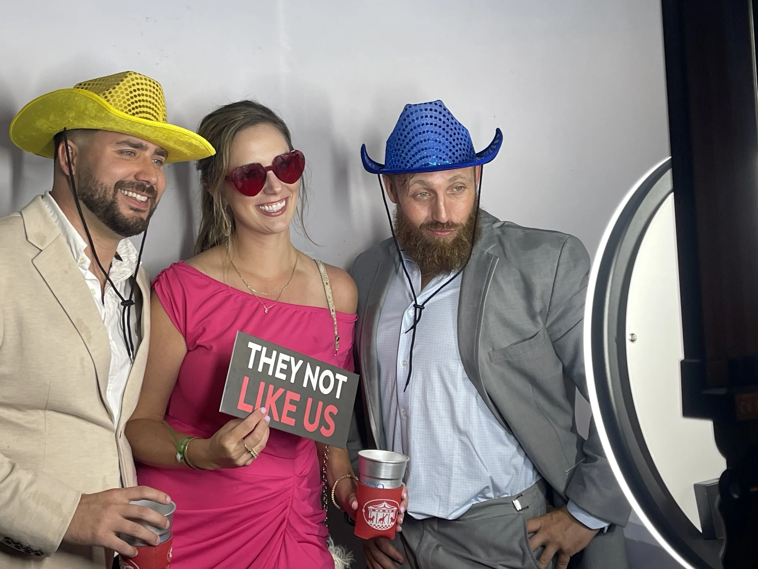 Guests using a luxury digital photo booth rental at Zoo To Do in New Orleans