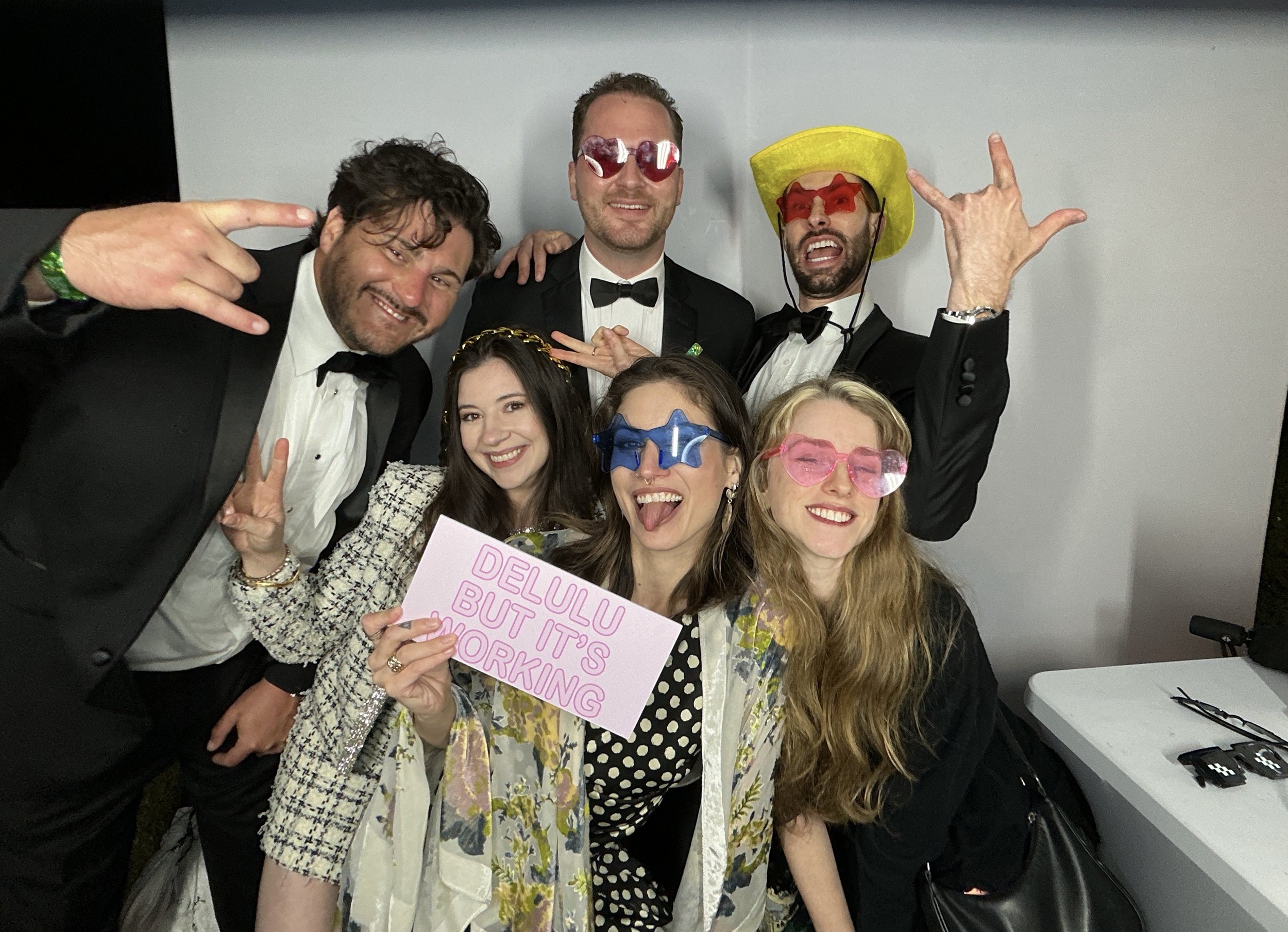 Guests enjoying a luxury digital photo booth rental at a corporate celebration in New Orleans