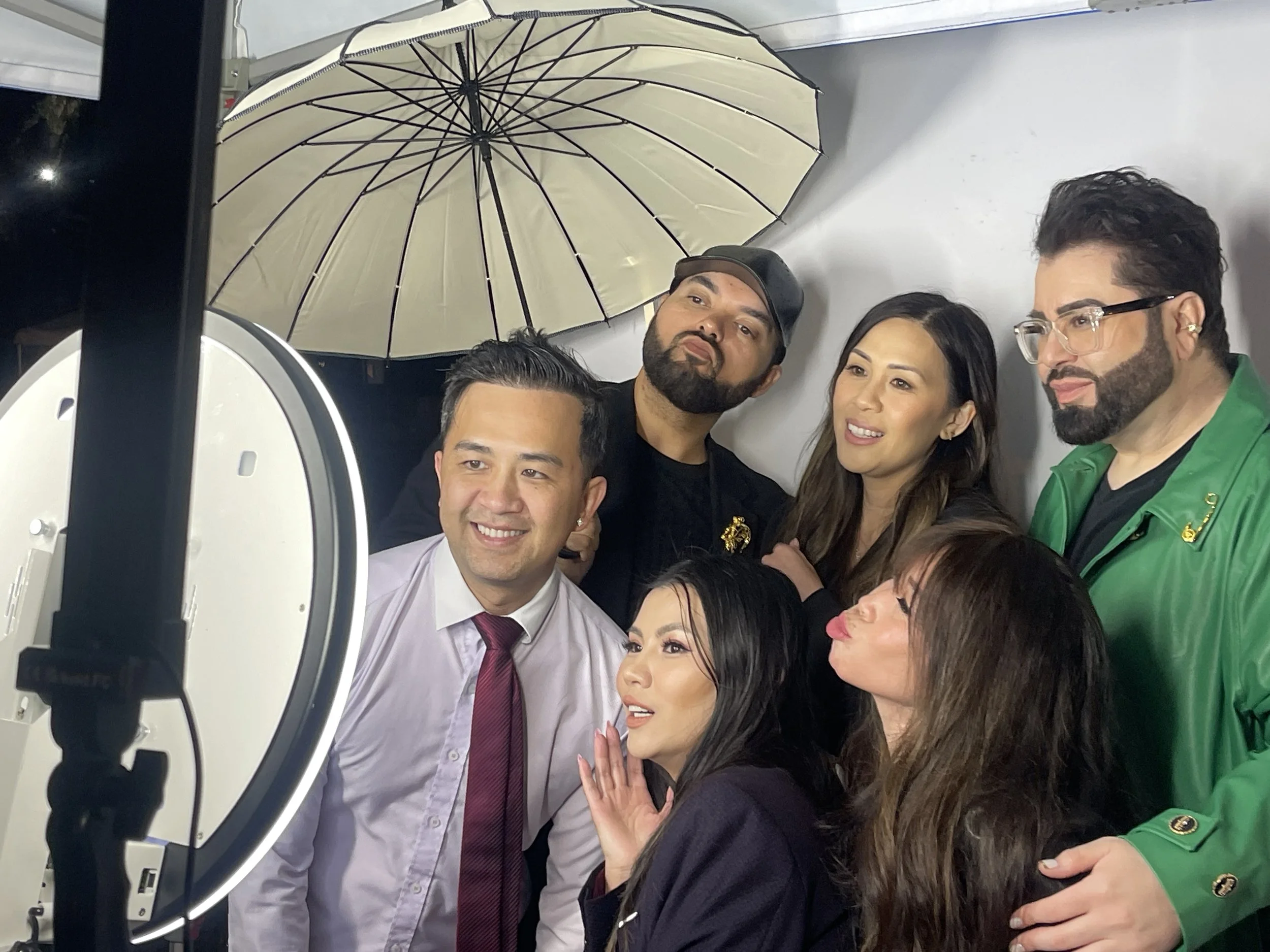 Guests enjoying a luxury digital photo booth rental in New Orleans with instant photo sharing and custom event overlays