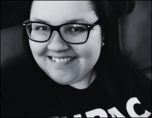 A black-and-white headshot of the author, Holly E. Burgess, smiling and wearing glasses and a Tupac t-shirt.
