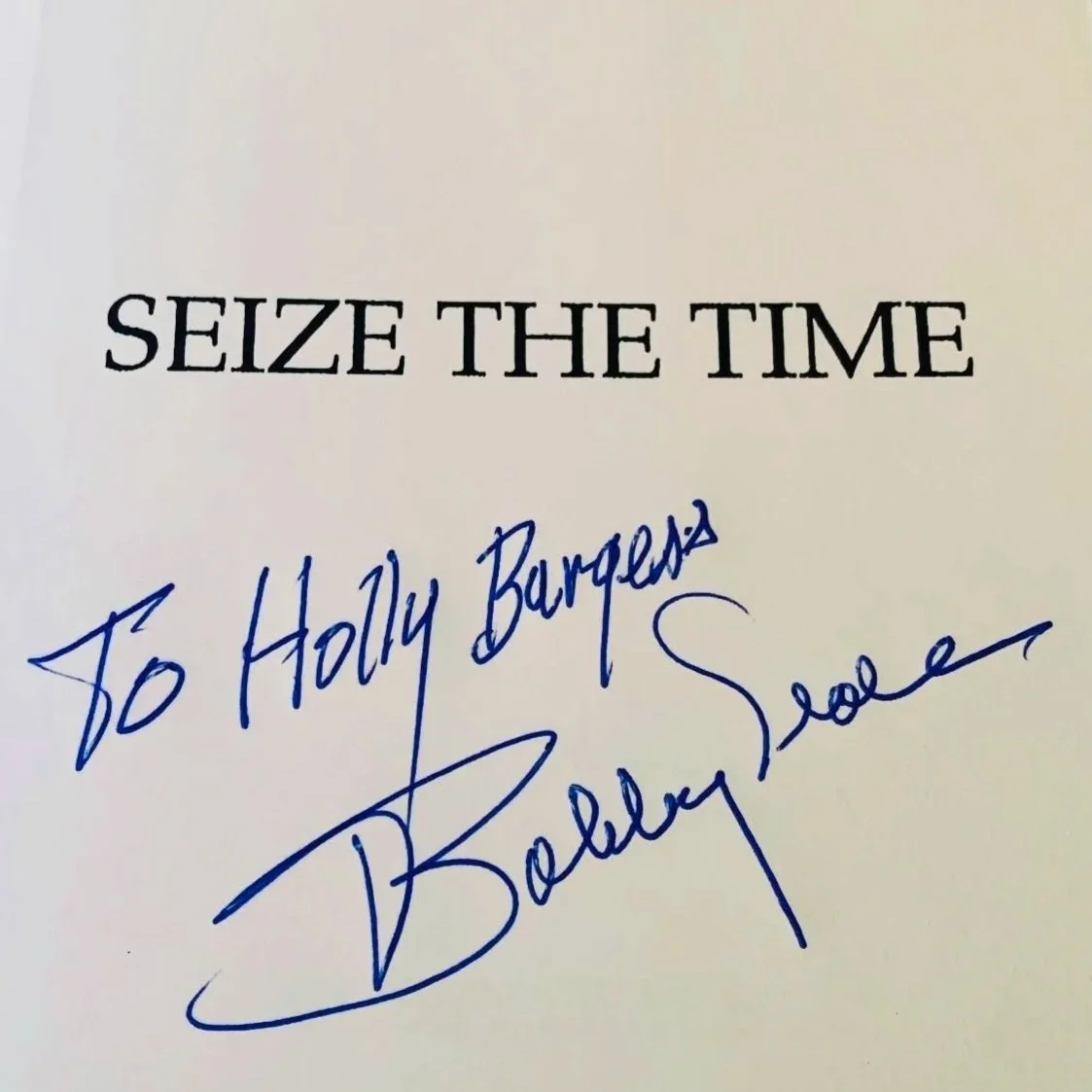 An autographed copy of Bobby Seale's "Seize the Time" he inscribed "To Holly Burgess"