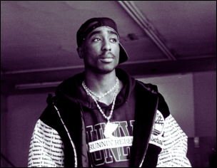 Black and white portrait of Tupac Shakur in a "Runnin' Rebel" hoodie, representing hip-hop culture and lyrical activism.