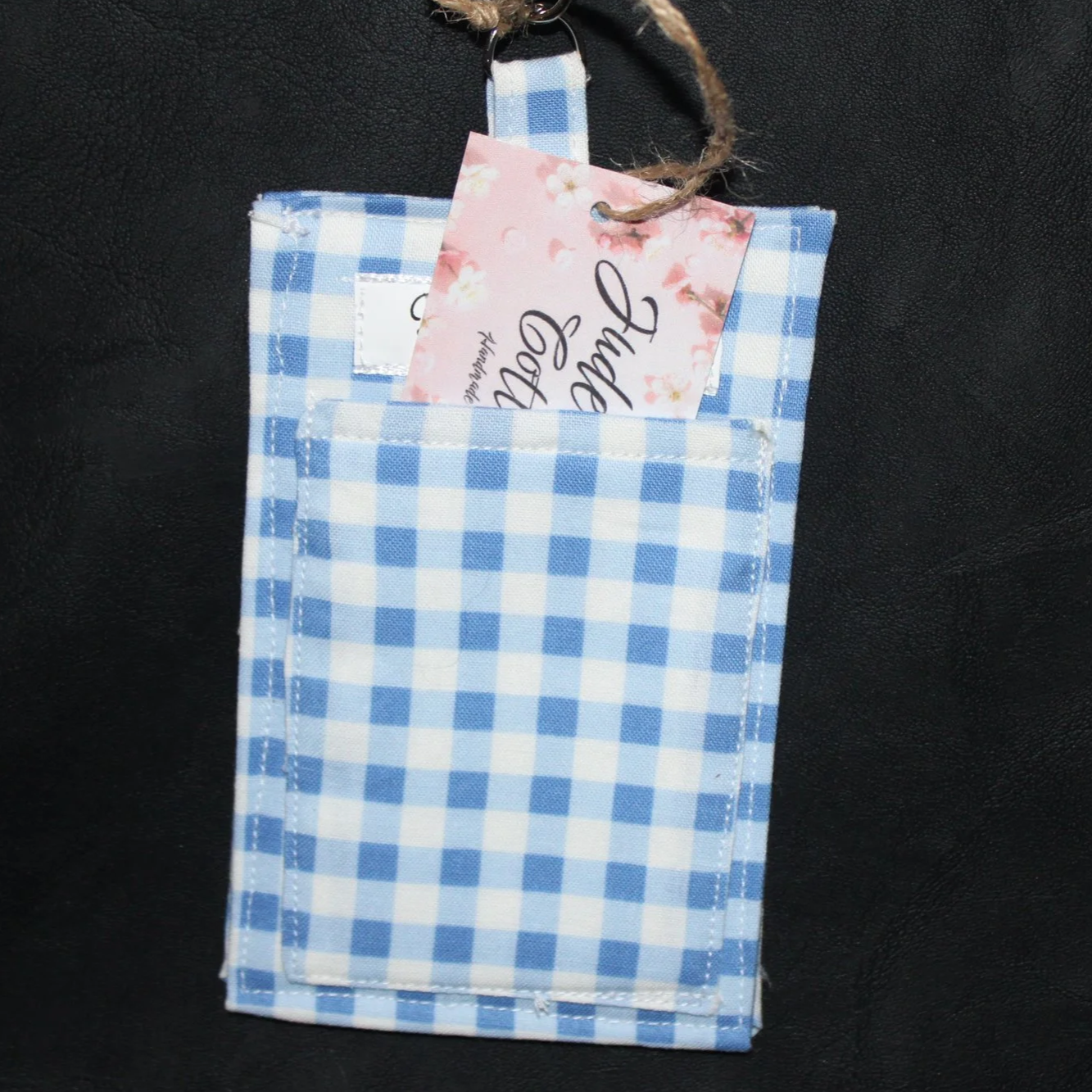 Back view of the Annabeth Badge Holder with card inserted illustrating slip pocket.