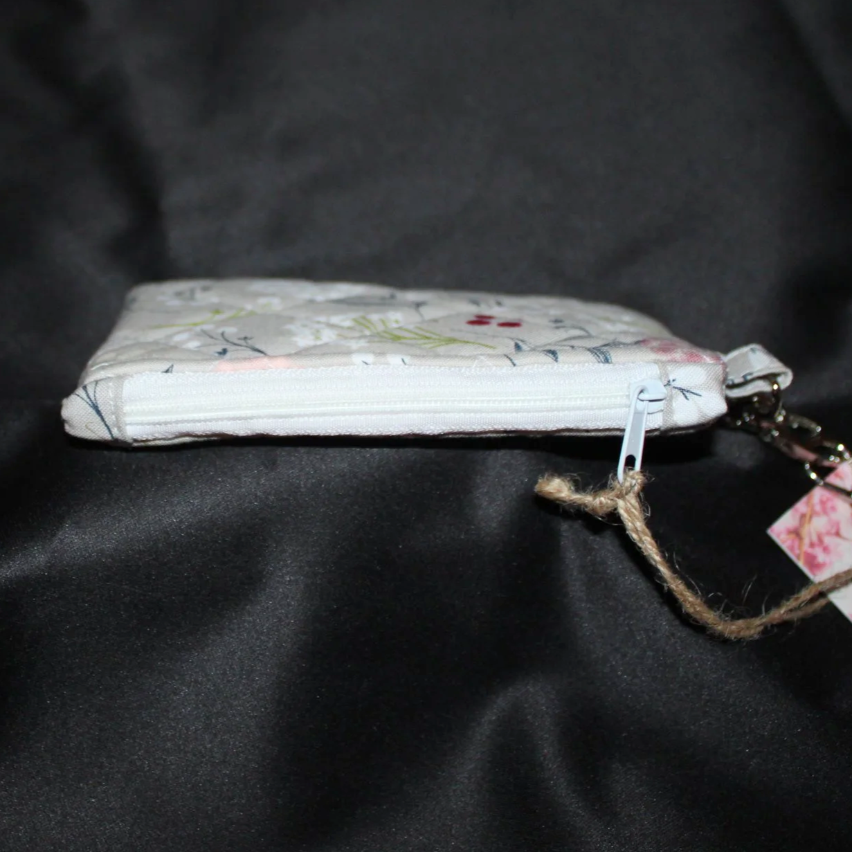 Top closed view of the Dandelion Field Wallet showing zip closure.