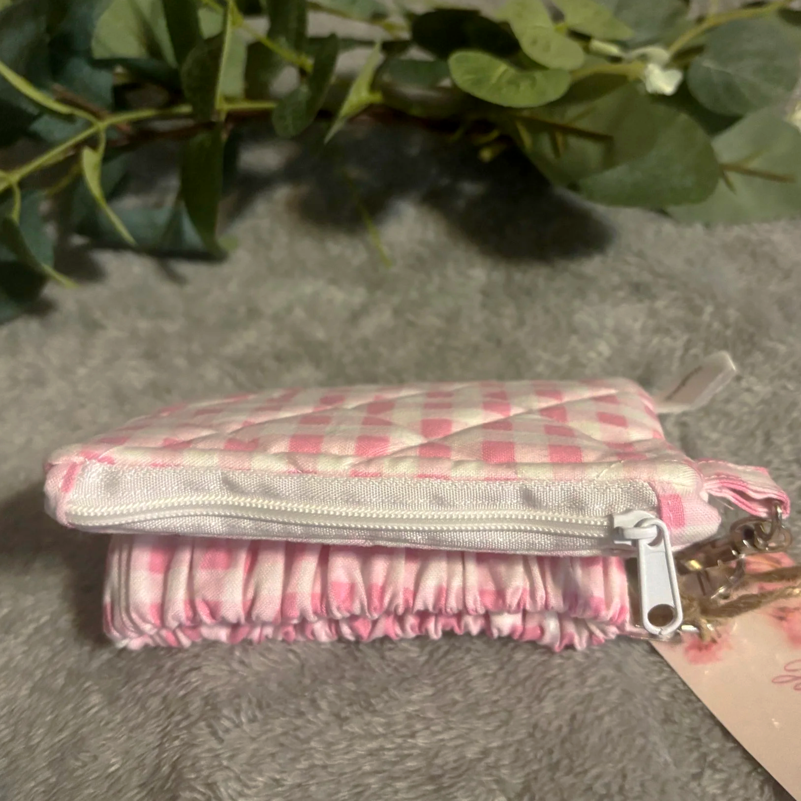 Top closed view of the Annabelle Keychain Wallet featuring pink gingham print fabric.