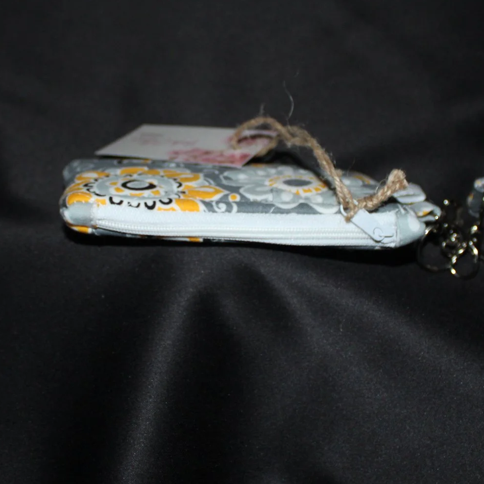 Top view of the Medallion Keychain Wallet showing zip closure.