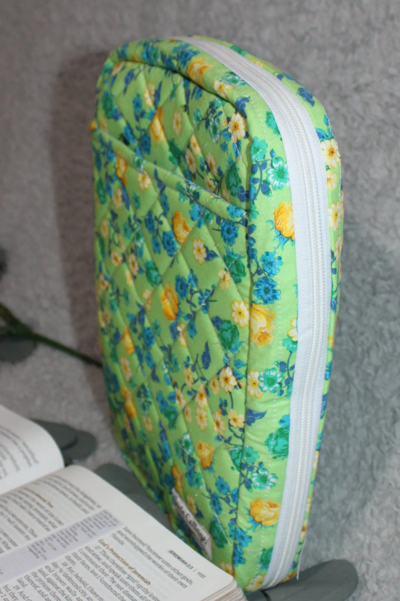Side view of the Suzanne Study Bible Case, shown upright with the sturdy zipper visible.