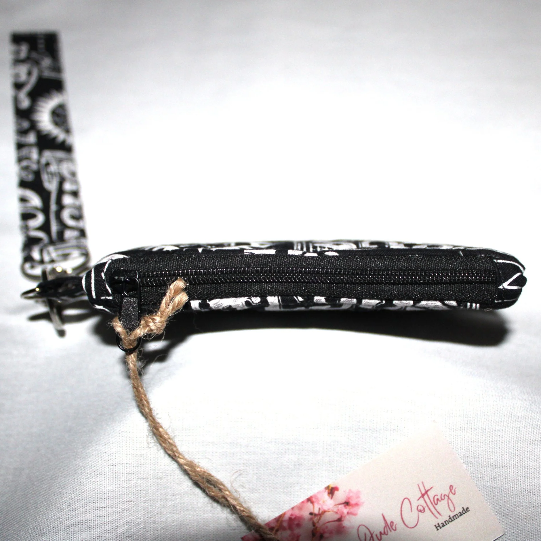 Top view of the King of Kings Keychain wallet showing zip enclosure.