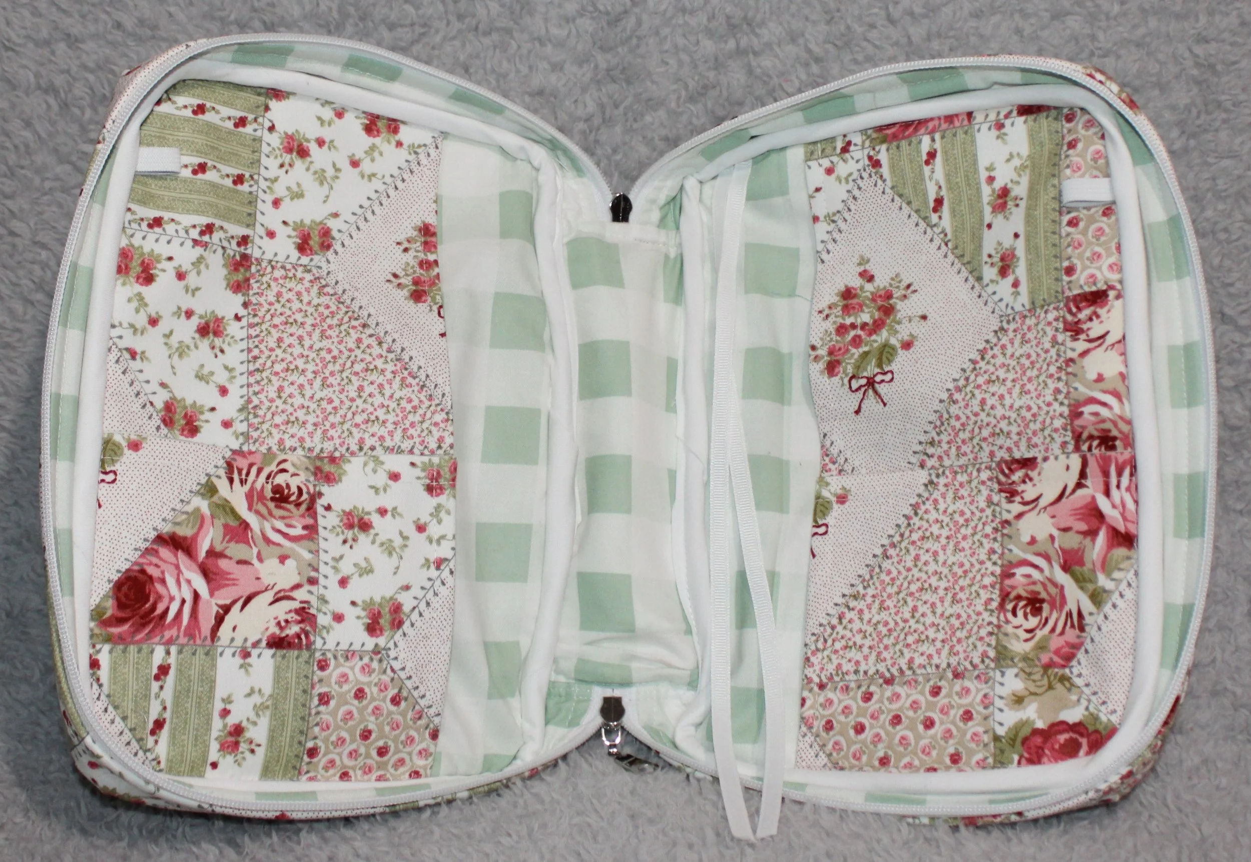 An empty interior view of Charity Bible Case showing interior fabrics, slip pockets, and pen holders.