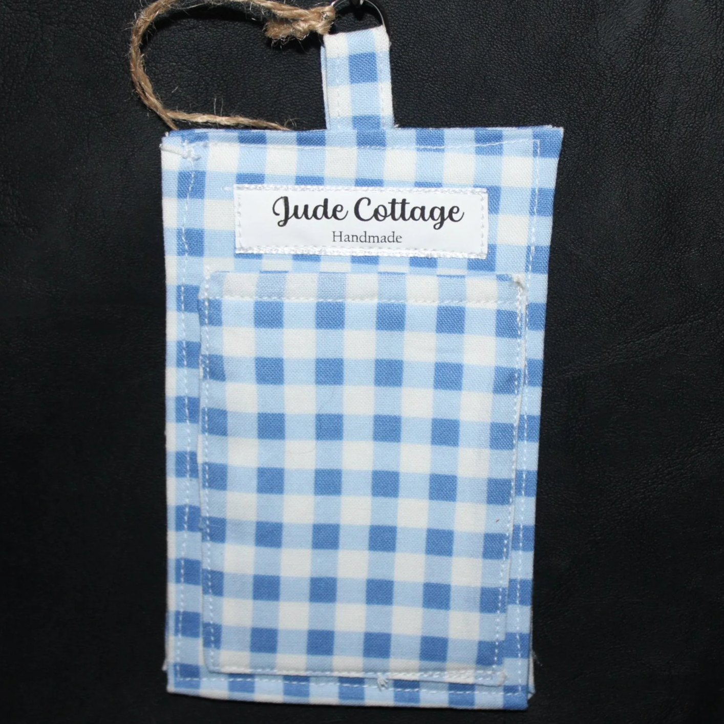 Empty back view of the Annabeth Badge holder featuring a slip pocket for cards, cash, or other essentials.