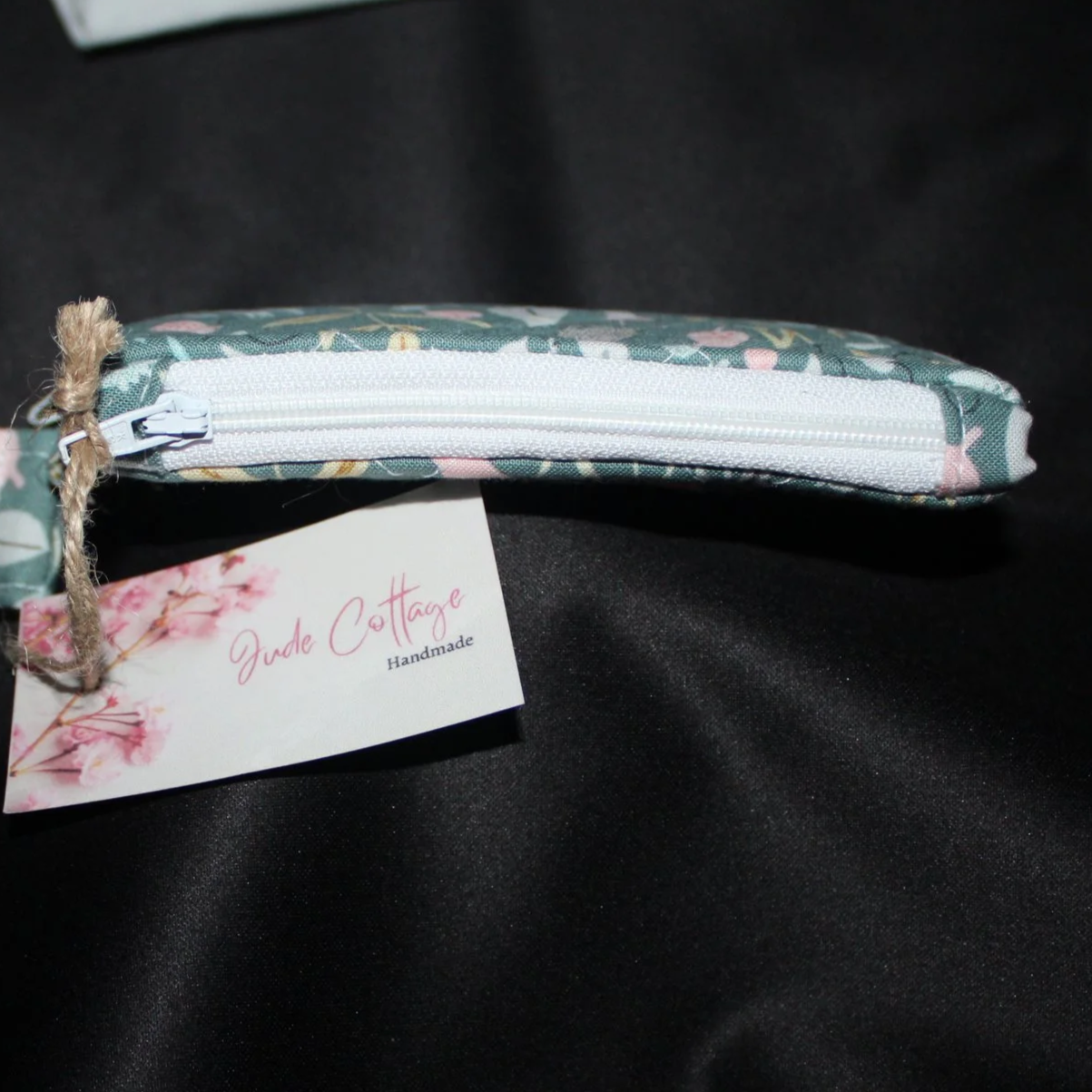 Top view of the Meadow Breeze Keychain wallet showing the zip enclosure.