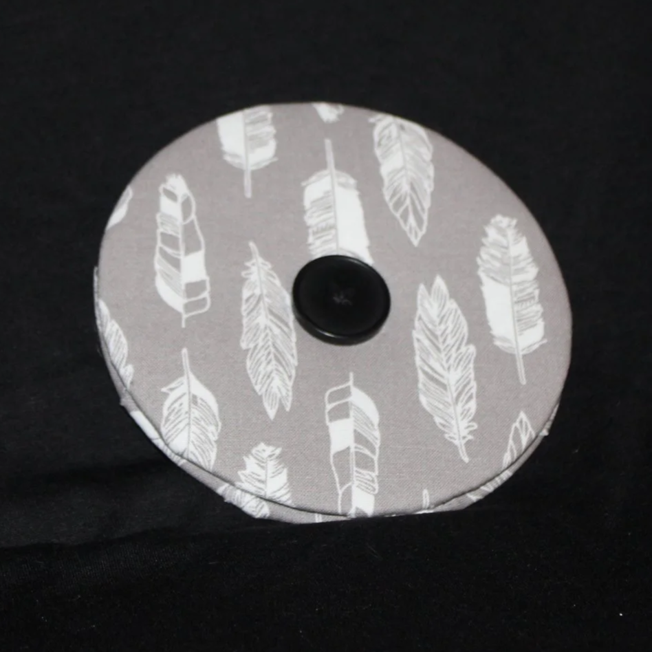 Front view of the Grey Feather Card Holder featuring a grey background with white feather motif print fabric.