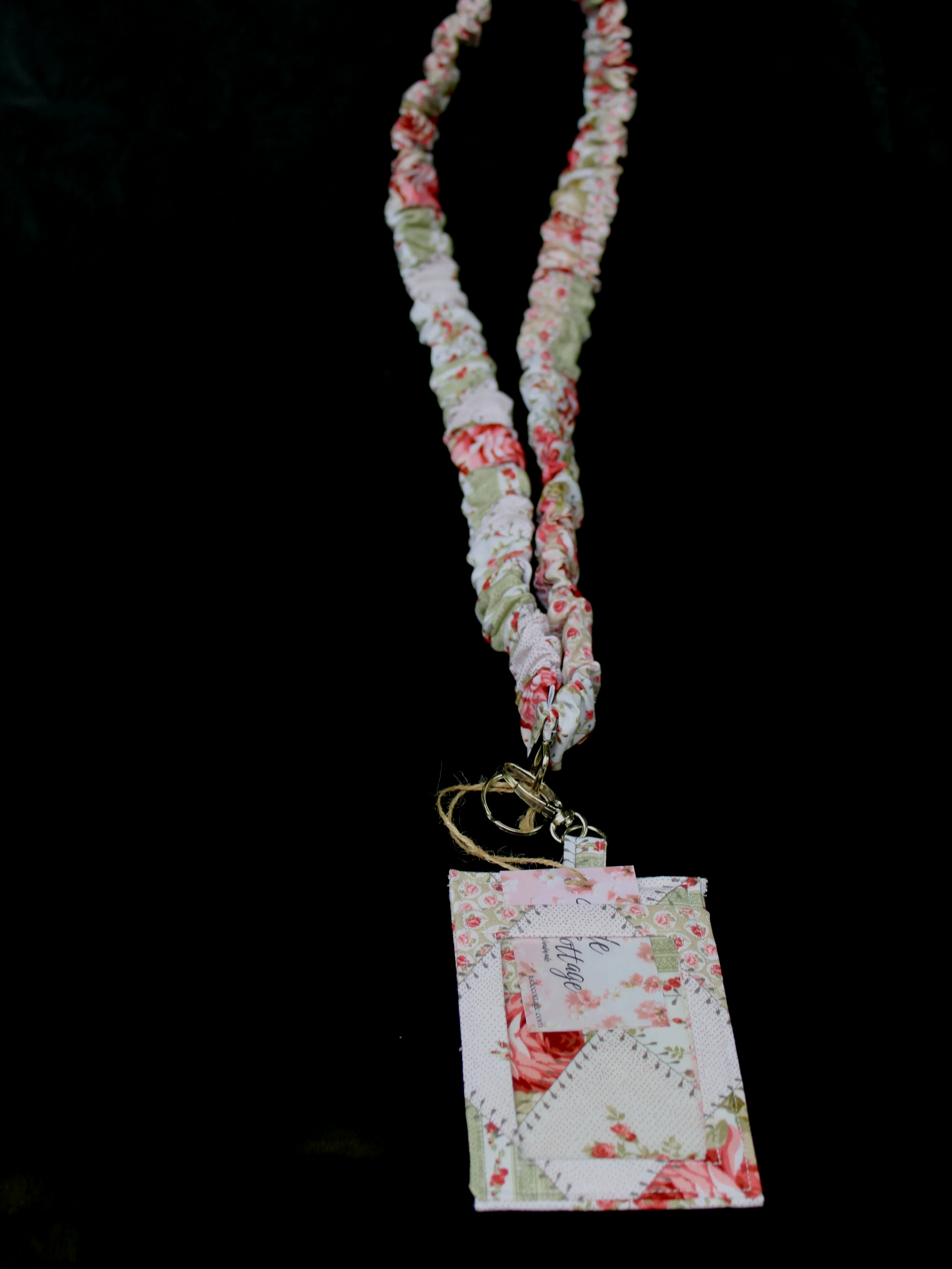 Front view of the Charity Scrunch Lanyard with card inserted partially into ID slot.