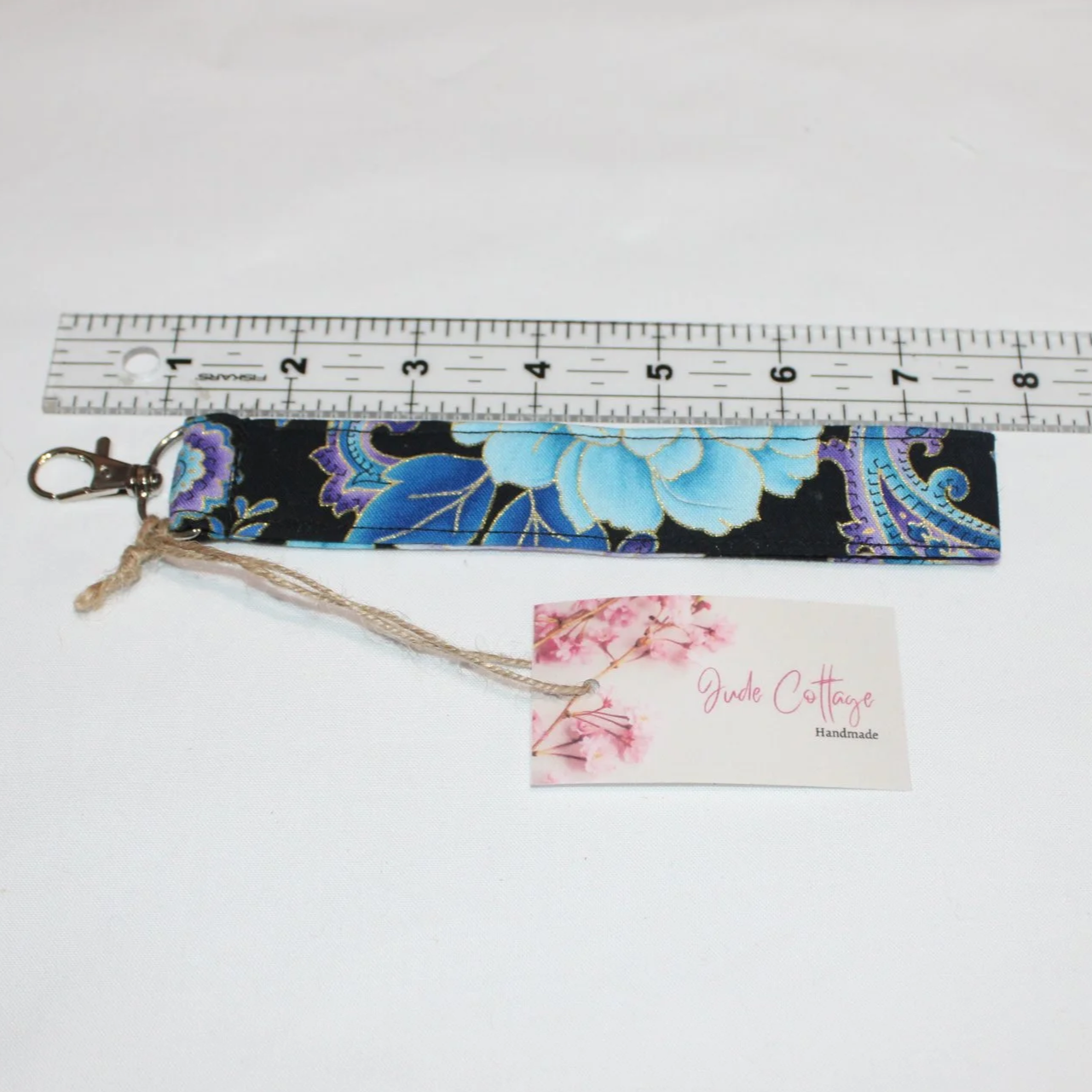 Twilight Paisley Wristlet shown with ruler to illustrate length.