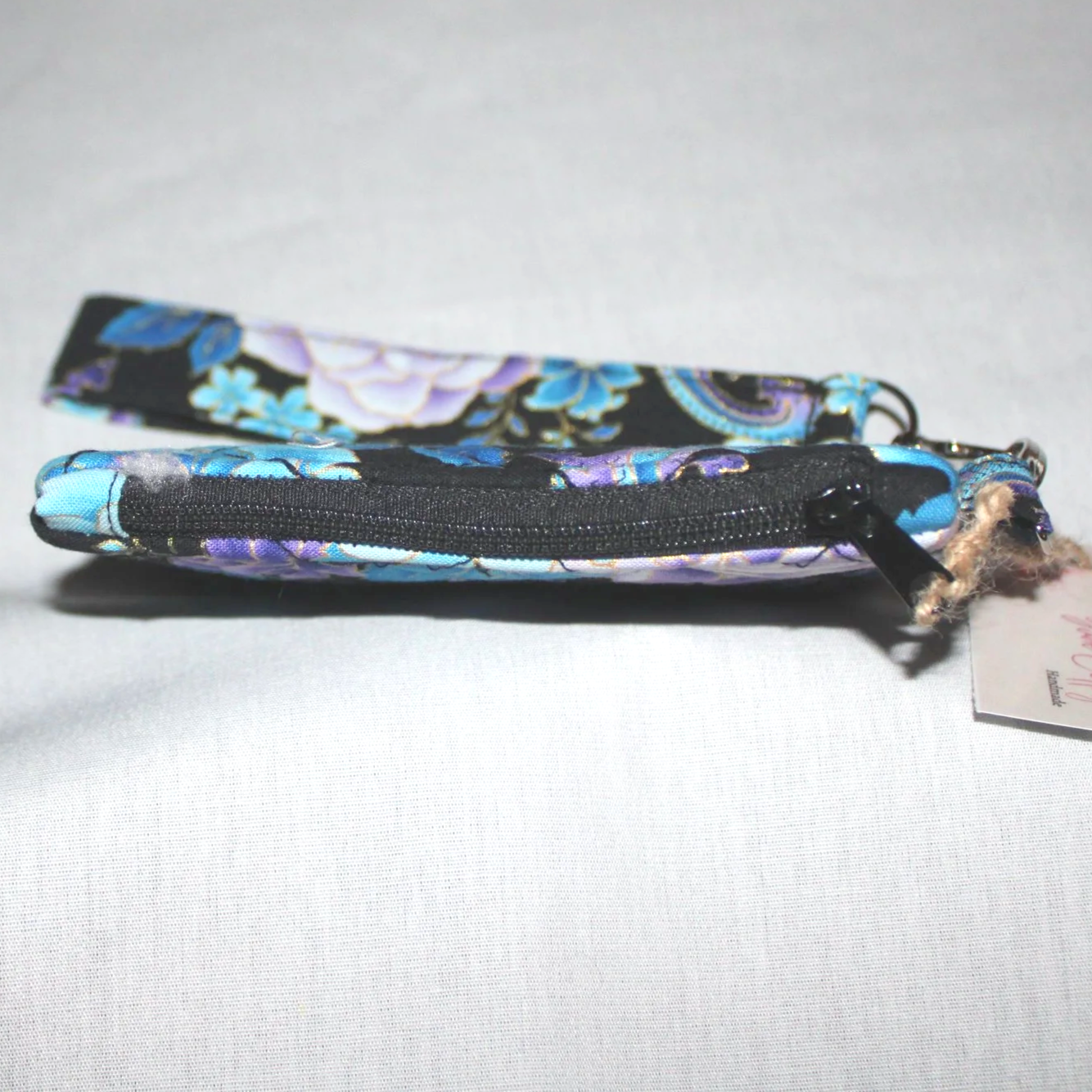 Top Closed view of the Twilight Paisley Wallet showing zip enclosure.
