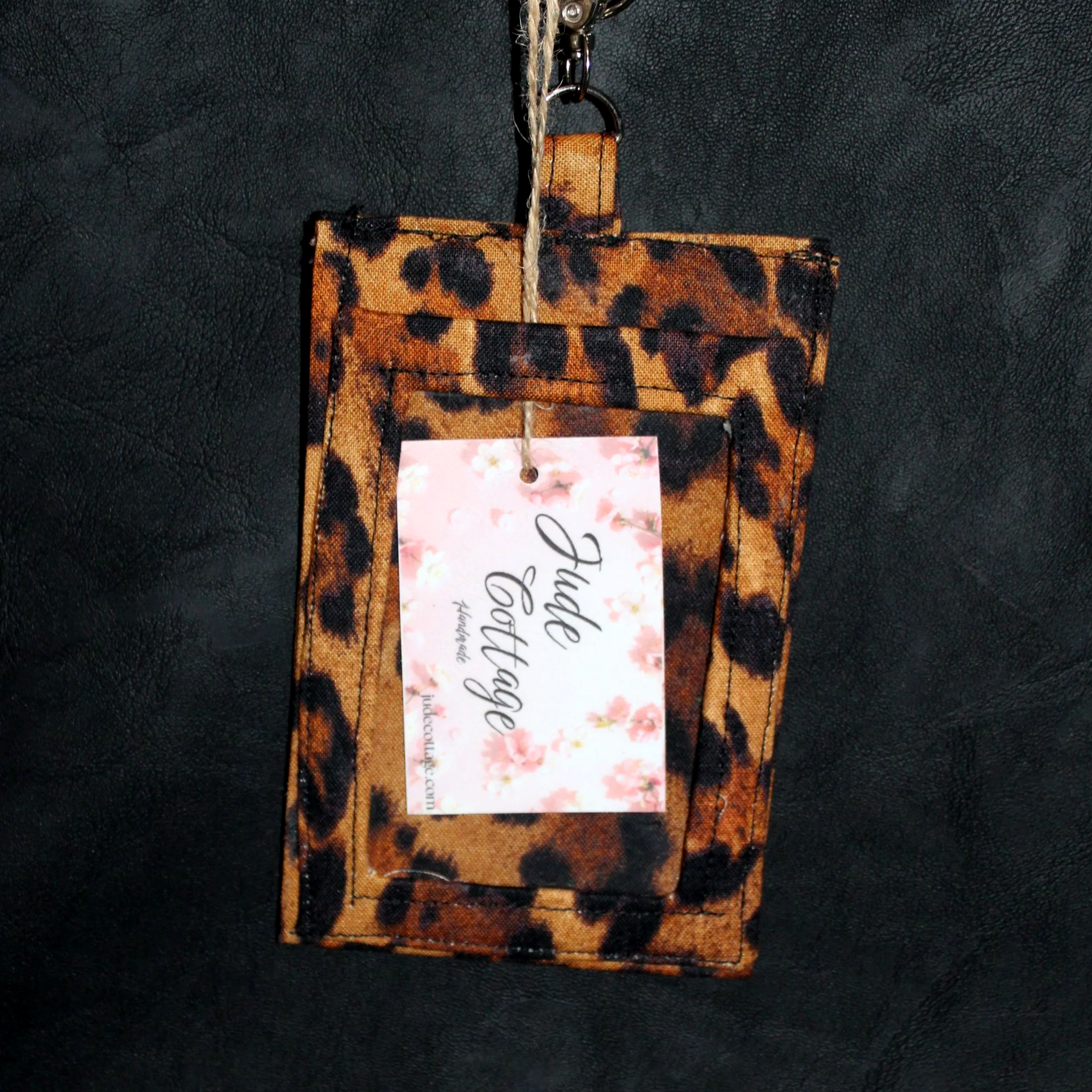 Front close up view of the Lyra Badge Holder featuring a clear ID slot shown with card inserted.
