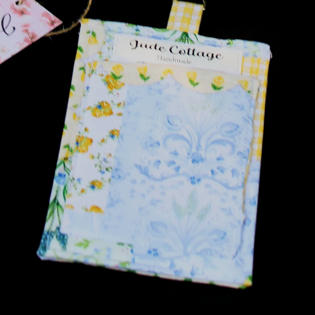 Back up-close empty view of the Annalee Badge Holder featuring a slip pocket for cash or card.