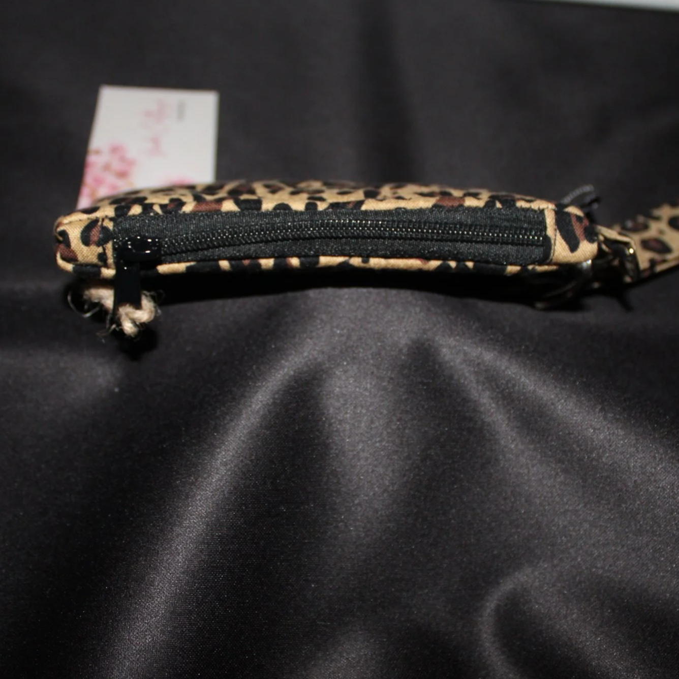 Top view of the Sahara Keychain wallet, showing zip enclosure.