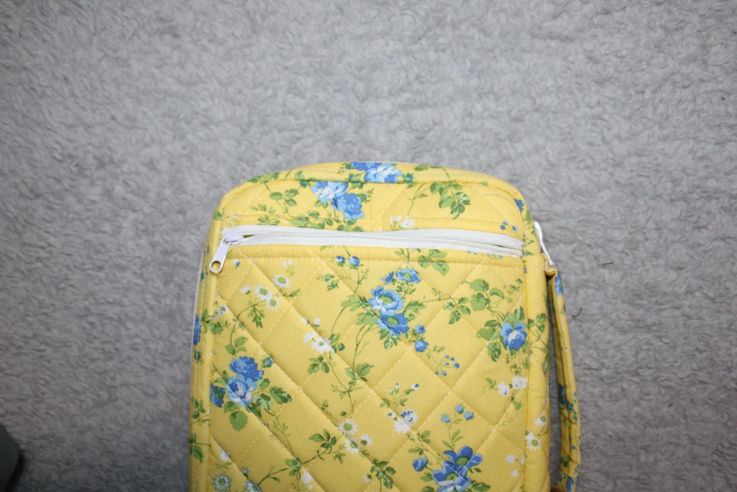 Back view of the Flora Study Bible Case, shown upright with the back zippered pocket visible.