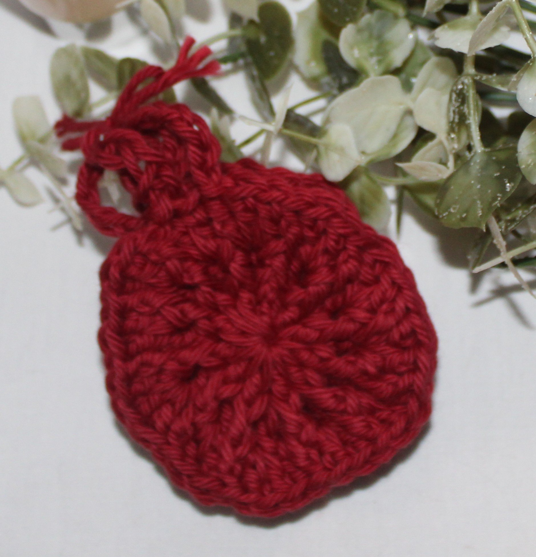 Set of handmade crochet facial pads in soft yarn, reusable and washable.