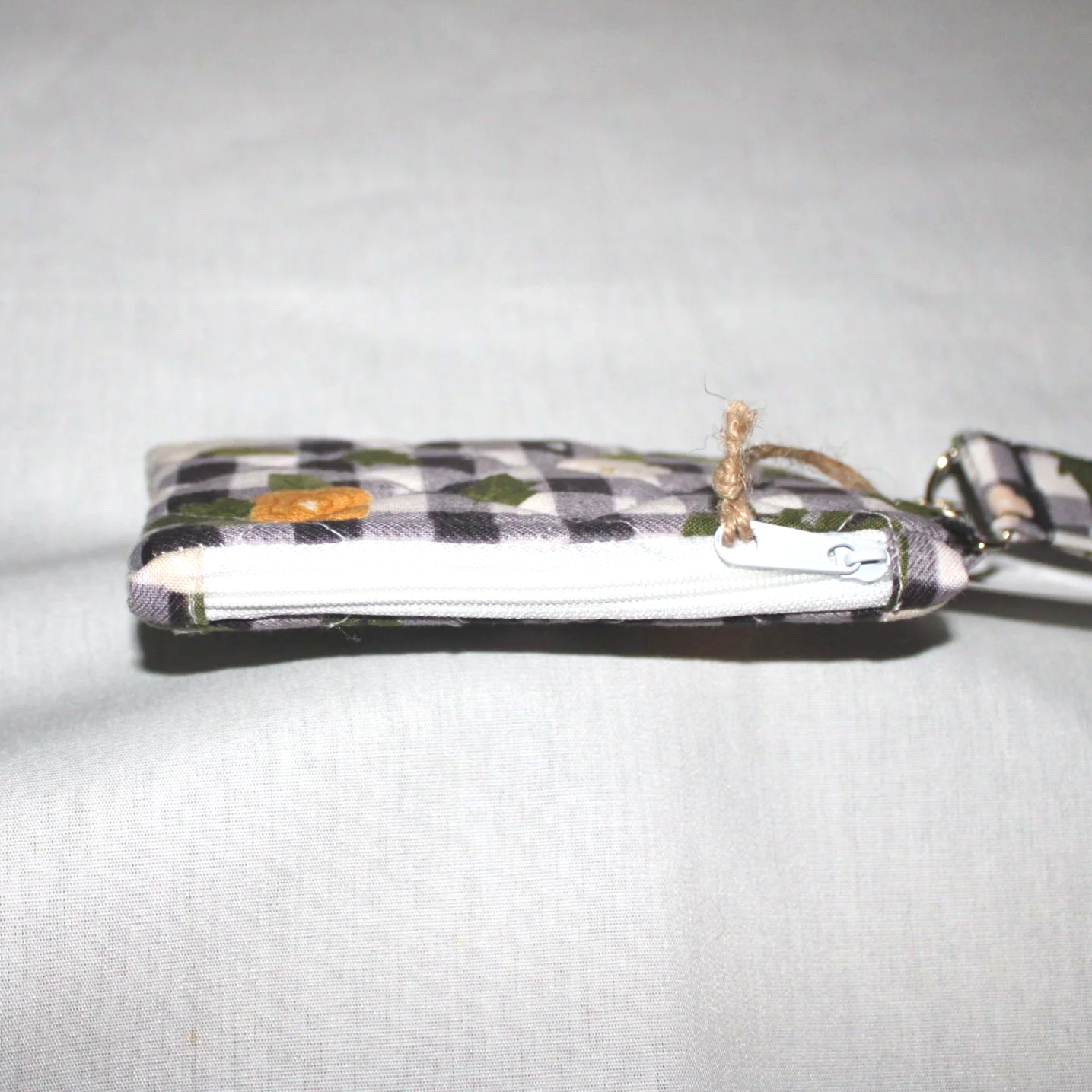 Top view of the Camilla Keychain Wallet showing zip enclosure.