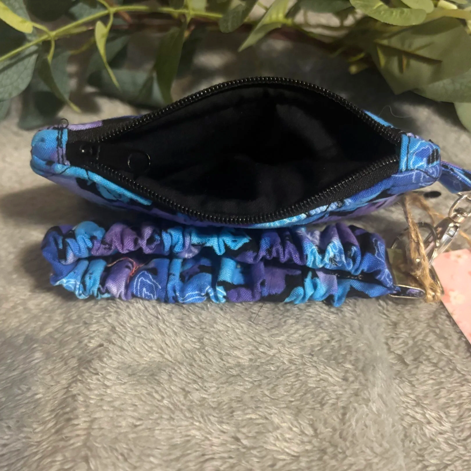 Top open view of the Butterfly Mist Keychain Wallet showing interior black lining.
