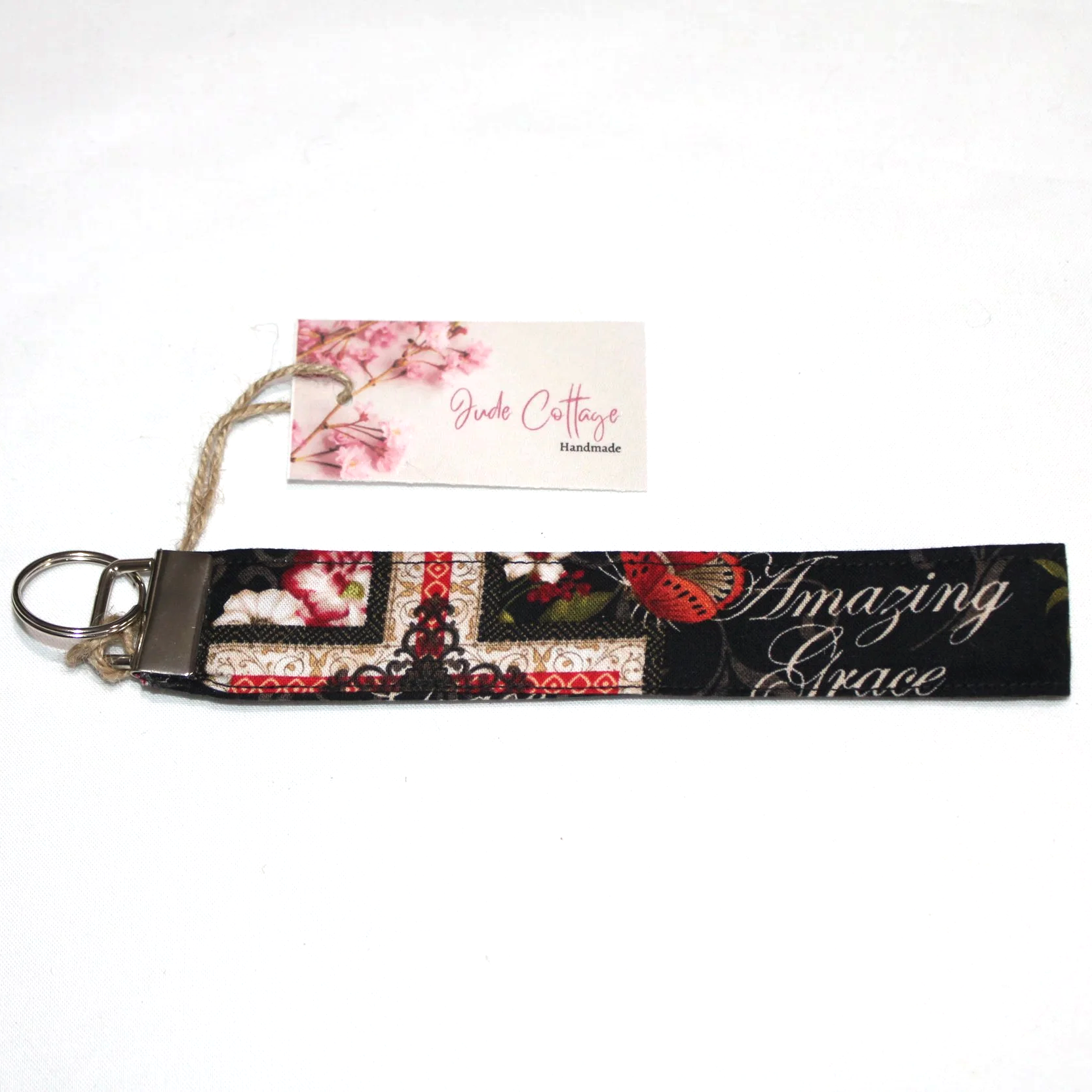 Close up view of the Amazing Grace Wristlet that comes included with the matching wallet.