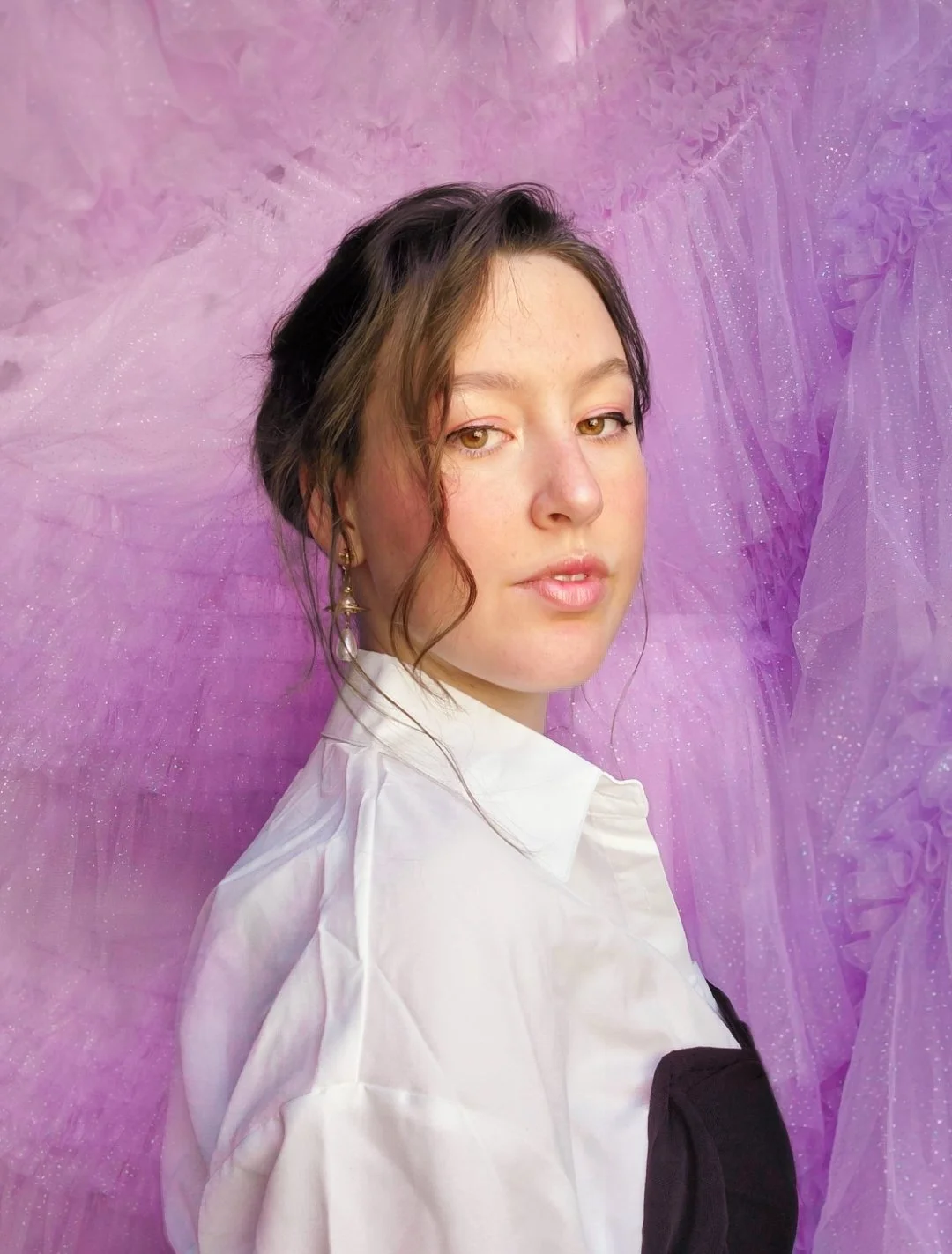 Image of Emma Ilene smiling at the camera.