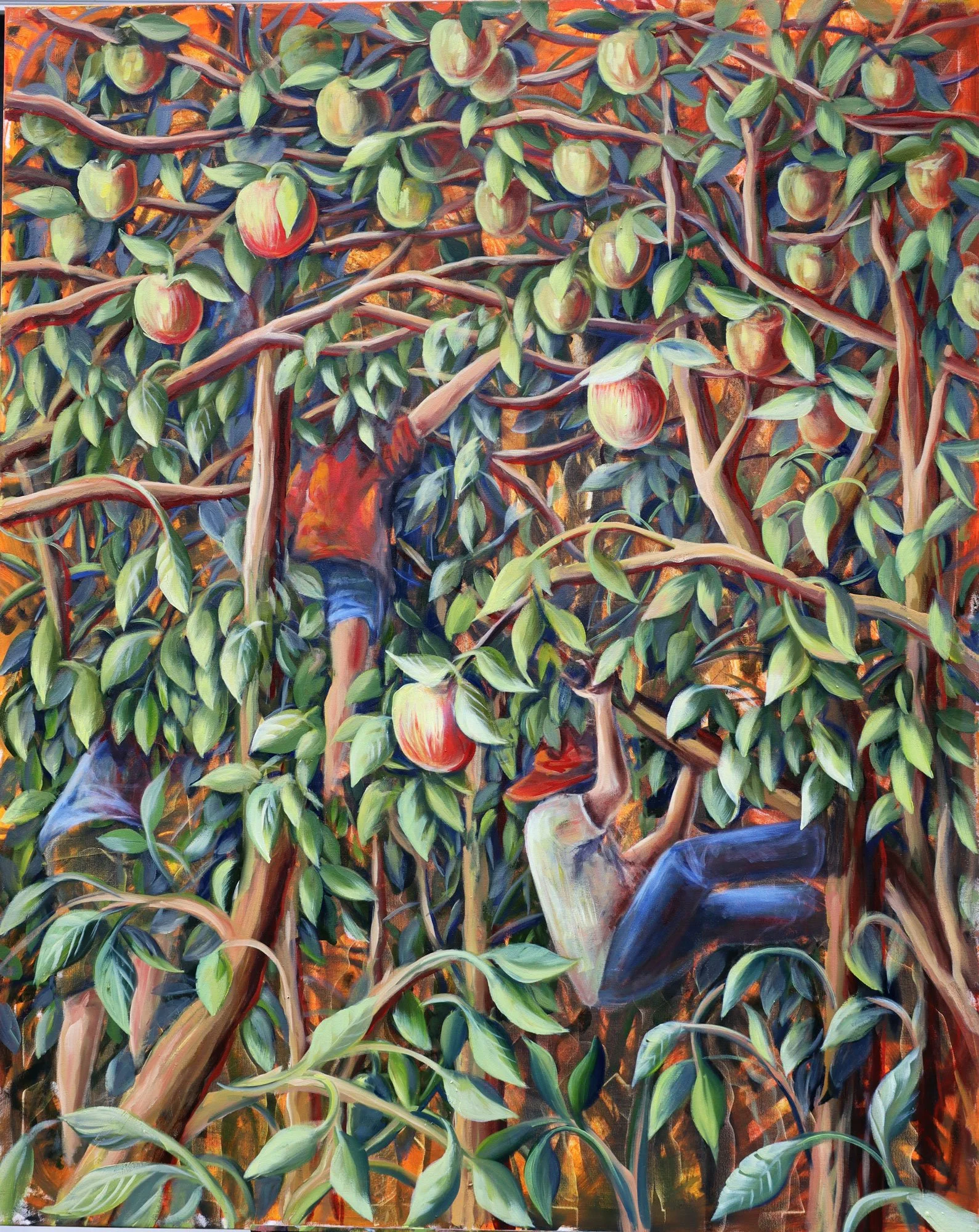 Two children climbing an apple tree with green leaves and ripe apples.