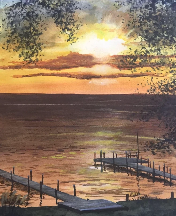 A watercolor painting of a sunset over a lake with two docks, silhouetted trees, and three small figures by the water's edge.