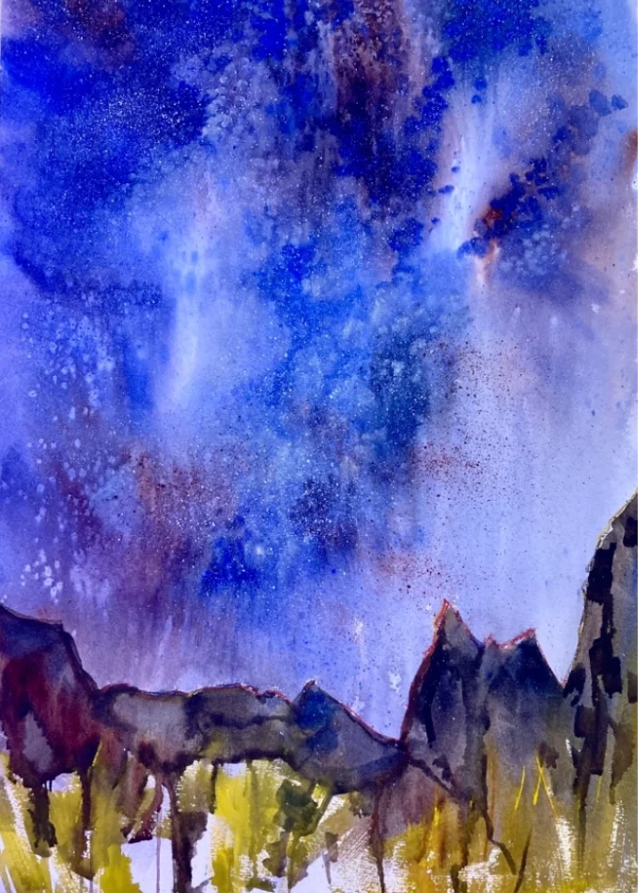 Watercolor painting of a starry night sky over mountains with yellowish foreground.