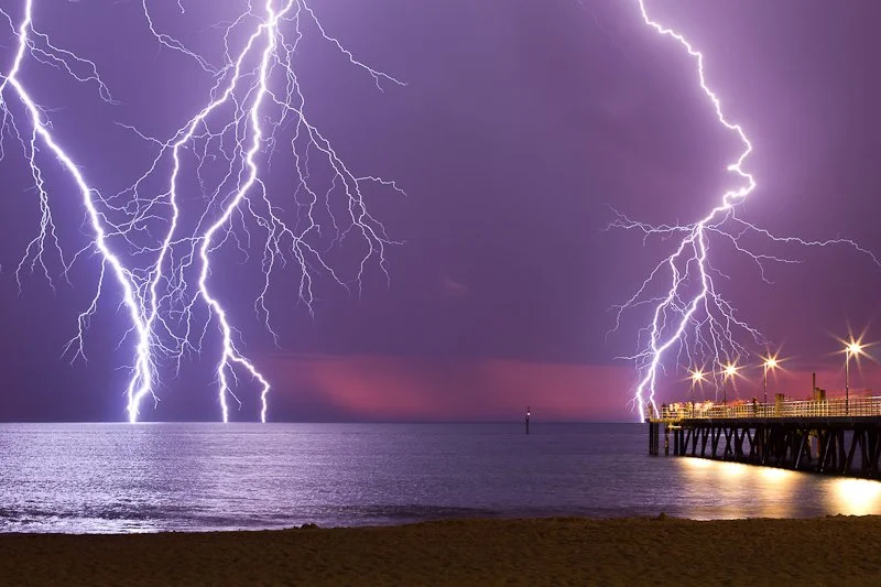 Glenelg storm with purple sunset by Ali Strous